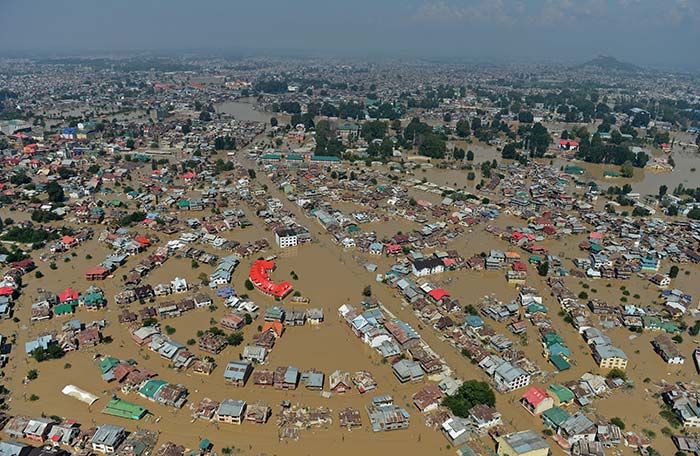 Kashmiri houseboats and houses submerged by floodwater are seen from an Indian Air Force helicopter during rescue and relief operations in Dal Lake in Srinagar on September 10, 2014. (Agence France-Presse)