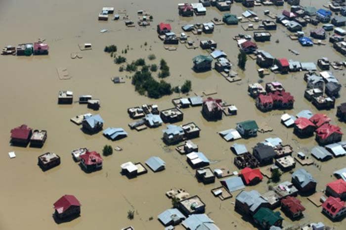 Kashmiri houseboats and houses submerged by floodwater are seen from an Indian Air Force helicopter during rescue and relief operations at Dal Lake in Srinagar on September 10, 2014. (Agence France-Presse)