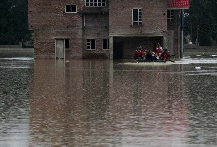 Srinagar is one of the worst-affected with people rapidly moving to safer areas as the Jhelum river overflowed beyond the danger limits (Agence France Presse photo)