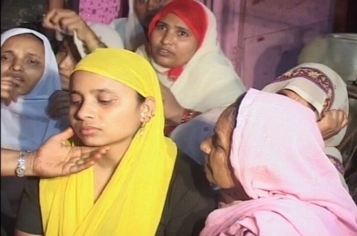 The deceased's mother being consoled by relatives after her son's death in Mankhurd area of Mumbai. (NDTV Photo)