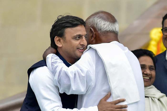 JDS chief HD Deve Gowda hugs former chief minister of Uttar Pradesh Akhilesh Yadav