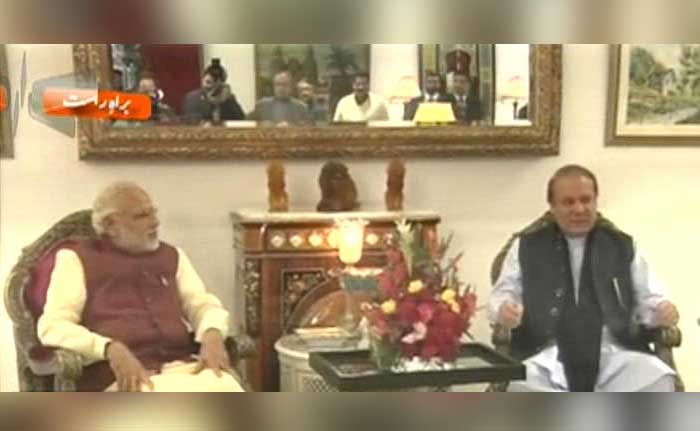 PM Modi with his Pakistani counterpart at latter's residence near Lahore.