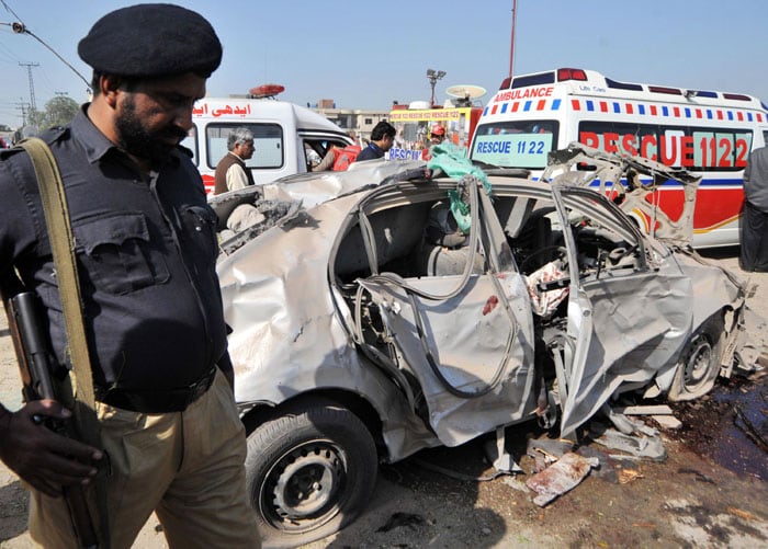 A car laden with explosives rammed a government building in Lahore on Monday, killing at least eight people, leaving 45 injured and heavily damaging the building.<br><br>Many more casualties are feared as people are believed to be trapped under the rubble. (AFP Photo)