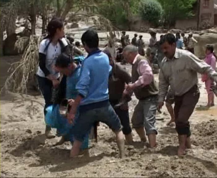 The tourist haven has been completely devastated by these flash floods. Rescue efforts were being hampered by gushing water and debris.