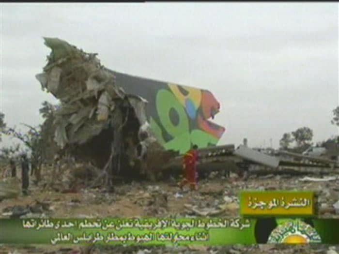 The image from Libyan television shows a section of the fuselage from the Afriqiyah's flight 771 amid the wreckage. (AP Image)