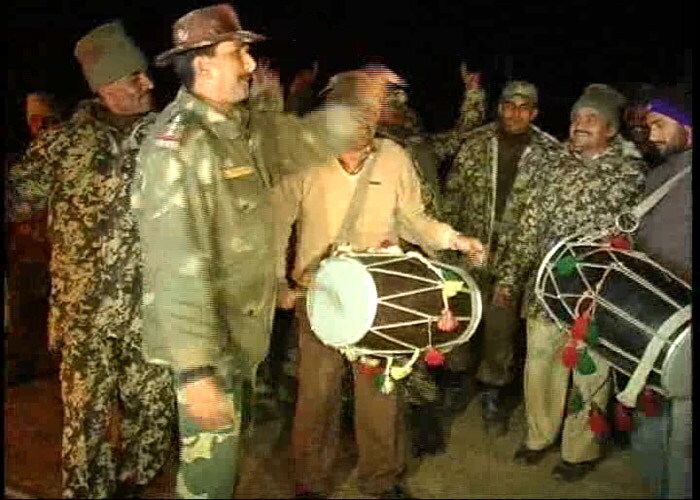 BSF jawans on the border revel in the Lohri celebrations. (NDTV Photo)<br><br><a href="http://www.ndtv.com/news/redirect/url.php?from=homePageWatch&forward_url=http://www.ndtv.com/news/videos/video_player.php?id=1192742" class="text2_link" target="_blank">(Watch: Pongal cheer in Tamil Nadu)</a><br><br><a href="http://www.ndtv.com/news/cities/jaipur_celebrates_makar_sankranti_with_mj_kites.php" class="text2_link" target="_blank">(Read: Jaipur celebrates Sankranti with MJ kites) </a><br><br><a href="http://www.ndtv.com/news/india/kumbh_mela_begins_in_haridwar_today.php" class="text2_link" target="_blank">(Read: Mahakumbh Mela begins in Haridwar today)</a><br><br><a href="http://www.ndtv.com/news/videos/video_player.php?id=1192751" class="text2_link" target="_blank">(Watch: Assam's fish feast)</a><br><br><a href="http://www.ndtv.com/news/redirect/url.php?from=homePageWatch&forward_url=http://www.ndtv.com/news/videos/video_player.php?id=1192748" class="text2_link" target="_blank">(Watch: Life of a Naga Sadhu)</a>