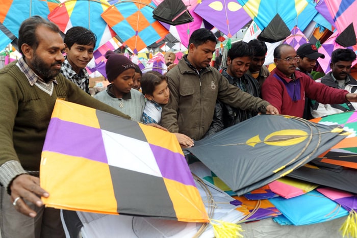 Makara Sankranti, celebrated a day after Lohri, is another major harvest festival. It is celebrated on January 14 across various parts of India. Celebrated on January 14 across India, it honours and worships <i>Saraswati Maa</i> (Goddess of Knowledge).<br><br>People offer their colorful oblations to the Sun in the form of beautiful kites. The act stands as a metaphor for reaching to Sun God. (AFP Photo)