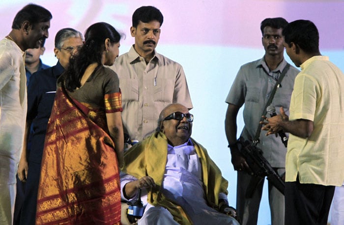 In South, Pongal is celebrated to mark the harvest season. In Tamil, Pongal means 'boiling over or spill over'. The act of boiling over of milk in the clay pot is considered to denote future wishes for the family.<br><br>Seen here, Tamil Nadu Chief Minister M Karunanidhi and his daughter Kanimozhi along with other leaders during inauguration of Chennai Sangamam organised as part of Pongal celebrations in Chennai.