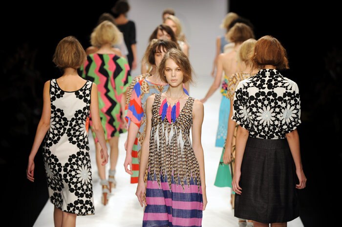 Models walk down the catwalk wearing clothes by Eley Kishimoto for the Spring/Summer 2010 collection on the third day of the London Fashion Week, in central London, on September 20, 2009. AFP PHOTO/Ben Stansall