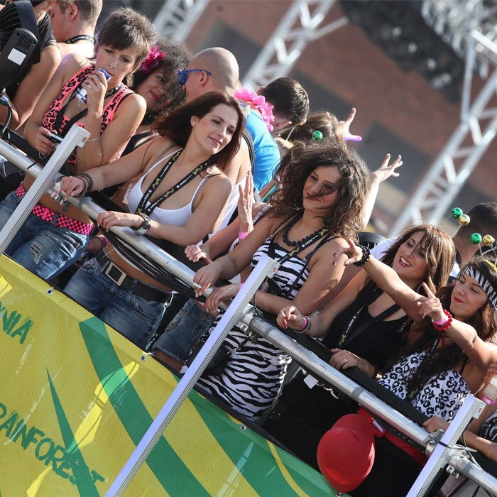 The image shows a complete gallery filled with people decked up for the Love Parade 2010 dance festival. (AFP Photo).