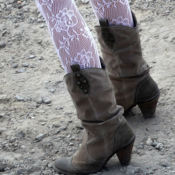 Participants try all ways out to grab attention during this dance festival. this image shows the trendy boots of a participant of the Love Parade 2010. (AFP Photo).