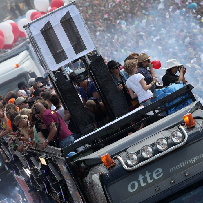 This image shows the grand entry of some participants of the Love Parade 2010 dance festival. (AFP Photo).