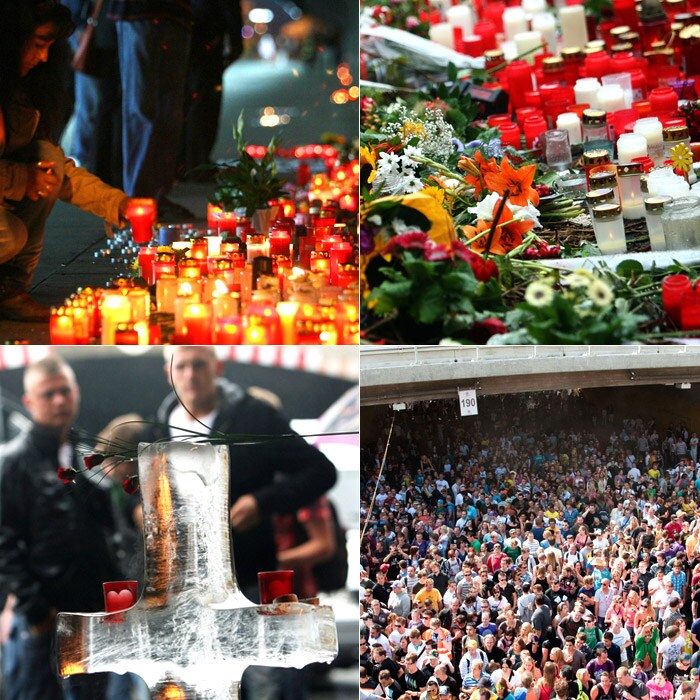 These are the images of the memorial service held in Duisburg to pay tribute to those who died in the German Love Parade.<br> <br>A woman lights a candle at the make-shift memorial site near the tunnel where panic broke out during the Love Parade in Duisburg, western Germany. <br> <br> 20 people were killed and more than 300 injured in this mass pandemonium during Love Parade on July 24, 2010. <br> <br> The Love Parade is a popular electronic dance music festival that originated in Berlin in 1989.<br> <br> Over the years it gained huge popularity and every year drew hundreds of people. However, on July 24 a stampede that broke out at the venue, marred the festival killing many.  (AFP Photo).