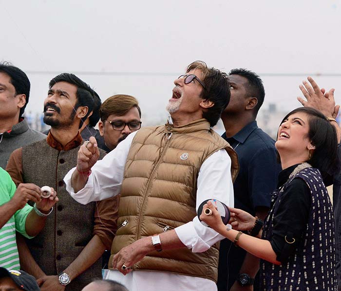 Ambitab Bachchan with Akshara Hassan and Dhanush enjoying kite flying 'Shamitabh' on Makar Sankranti in Ahmedabad. (Press Trust of India)