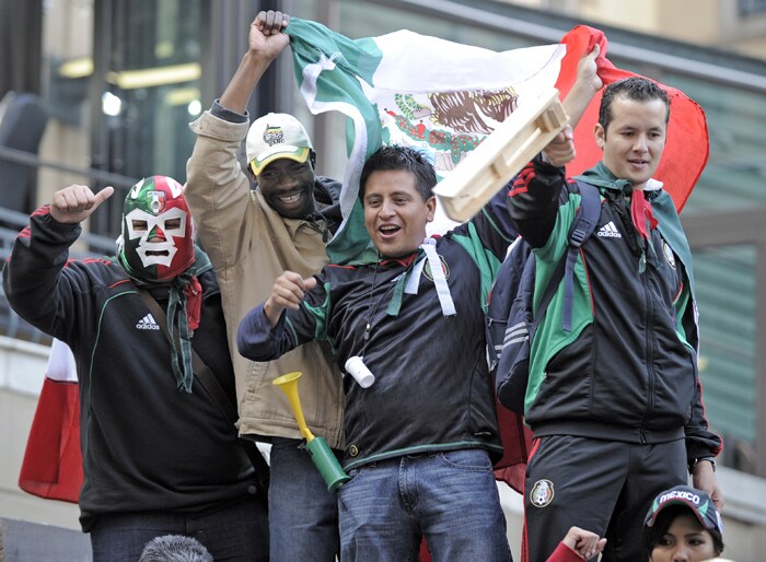 On Friday, streets in downtown Johannesburg were filled with cars and pedestrians waving South African flags and blowing vuvuzelas in the hours soon after dawn, as news that one of Mandela's nine great grandchildren was emerging.