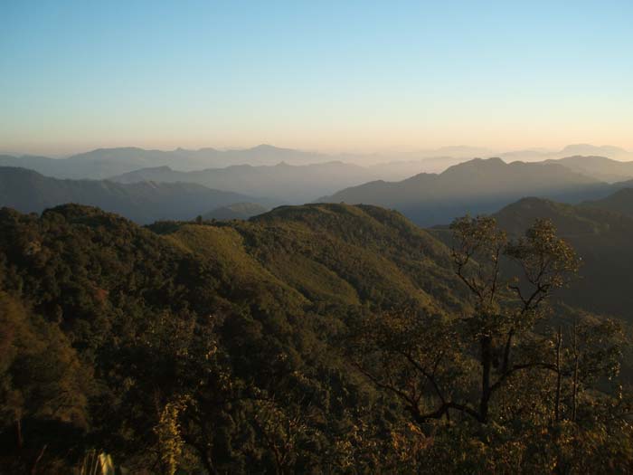 Across these hills is Assam where the road will lead to. (Photo courtesy: Kishalay Bhattacharjee)