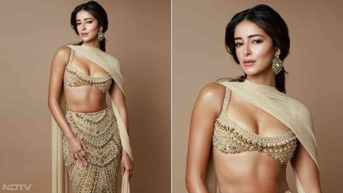 अनन्या पांडे पार्टी में गोल्डन एम्बेलिश्ड लहंगा पहनकर पहुंची थीं. उनका बॉडी-फिटेड लहंगा और स्कल्प्टेड ब्रालेट ब्लाउज बेहद स्टाइलिश था. बारीक सीक्विन और क्रिस्टल वर्क ने उनके लुक को और भी ग्लैमरस बना दिया.