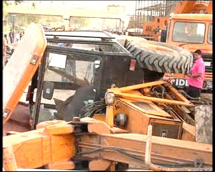 Two persons were injured when a mini-crane at a Delhi Metro construction site toppled and fell on an autorickshaw in south-east Delhi on Wednesday evening.<br><br>The incident took place at Alimore in Sarita Vihar at around 4:30 pm.<br><br>According to a Delhi Metro official, the mini-crane called hydra toppled and fell on an autorickshaw at a construction site between Mohan Estate and Tuglaqabad Metro stations on the Central Secretariat-Badarpur line.<br><br>The driver of the autorickshaw and a labourer identified as Rajesh (30) were injured in the incident. They were rushed to AIIMS Trauma Centre. (NDTV Photo)