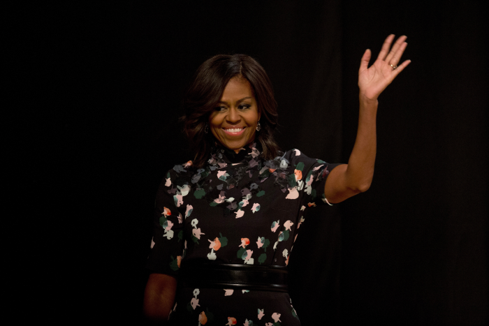 Little Black Dress: The First Lady was back to sporting flower patterns at the Town Hall in Siri Fort auditorium, New Delhi. <br><br> During the Town Hall, Barack Obama confessed to the audience, "Michelle is a better dancer than I am. Sometimes this hurts my feelings."