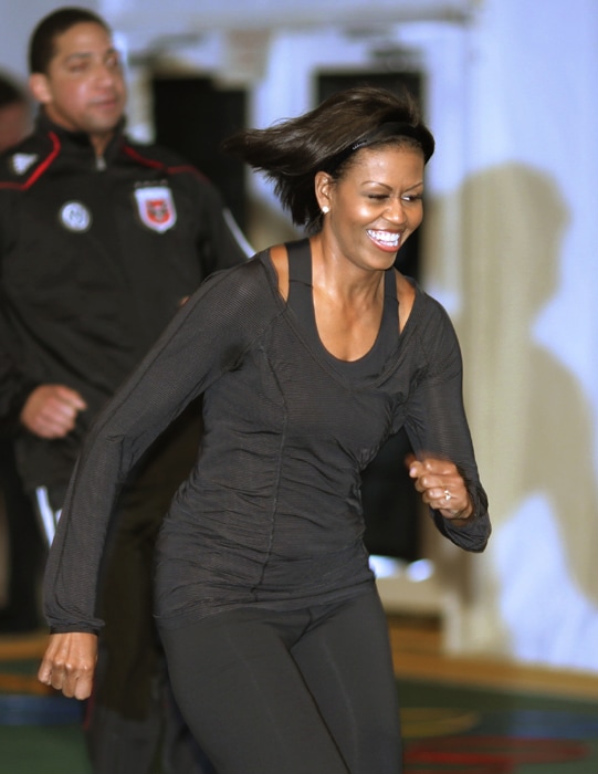 The groups are launching a 25-city tour to provide children and their families with free health screenings and soccer clinics. It's part of the first lady's "Let's Move" anti-obesity effort. (AP Image)