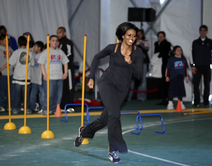 Her 11-year-old daughter Malia plays soccer. (AP Image)
