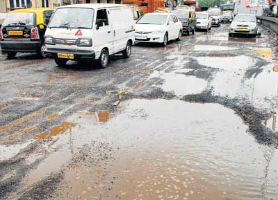 The BMC's budgetary allocation for pothole -elated road repair for this financial year was Rs 40 crore, of which a sizeable chunk of Rs 26 crore has already been spent.<br></br><br></br> <a href=" http://www.mid-day.com/" class="fa fn fl fs12"><b>Photo courtesy: Mid-Day.com</b></a>