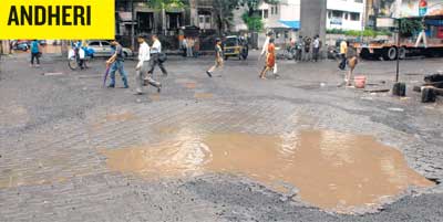 Naresh Dahibavkar, president of the Ganeshotsav Samanvaya Samiti said, "We are keeping tabs on BMC's work. The potholes that they repaired recently at Worli have all reappeared after the rains. We have been sending reminders to the authorities."<br></br><br></br> <a href=" http://www.mid-day.com/" class="fa fn fl fs12"><b>Photo courtesy: Mid-Day.com</b></a>