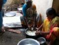 Photo : No lessons learnt? Mid-day meal cooked on septic tank next to toilet