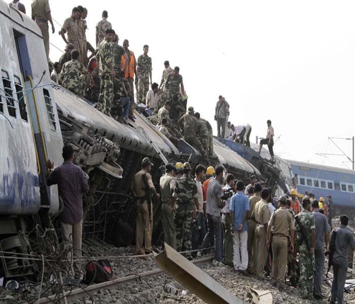 The bodies of the passengers were removed from the mangled remains of the ill-fated coaches and the injured taken out with the help of gas cutters, a South Eastern Railway spokesman said. (AP Image)