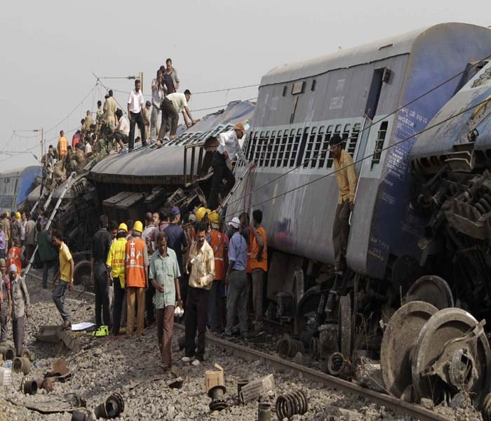 While Home Minister P Chidambaram has said that train derailment in West Bengal appears to be a case of sabotage, Railway Minister Mamata Banerjee said a bomb blast as part of a "calculated attack" caused the Gyaneshwari Express to first derail and then get hit by a goods train. (AP Image)