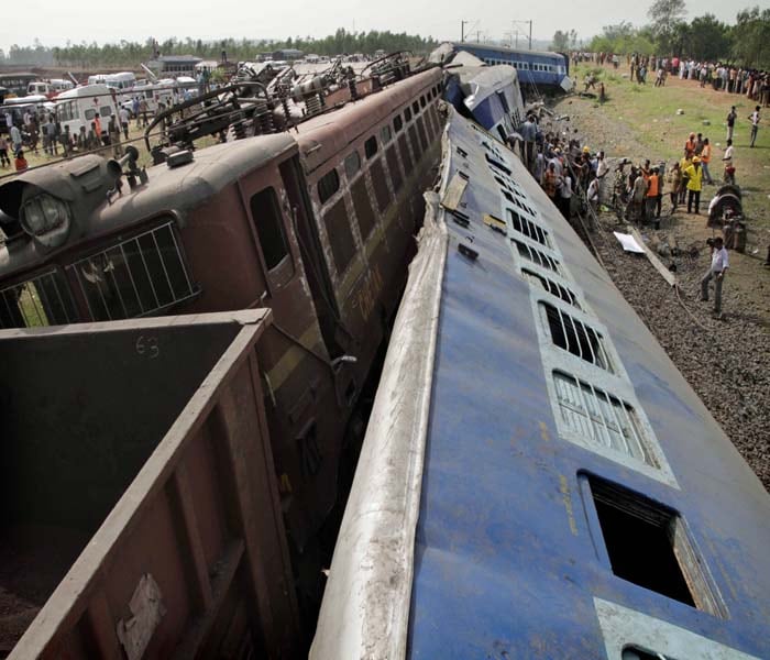 Around 100 passengers were killed and 200 injured when 13 coaches of a Mumbai-bound express train derailed in West Midnapore district on early Friday morning after Maoists sabotaged the train tracks.<br><br>As the rescue efforts were on, more bodies were pulled out from the wreckage of the mangled coaches. The rescuers were working throughout the night.<br><br>Scores of anxious relatives have been running from pillar to post trying to gather some information, hoping their loved ones are not among the dead or the injured.<br><br>Top officials met in Ranchi to discuss the threat to trains from Naxals on Saturday. (AP Image)