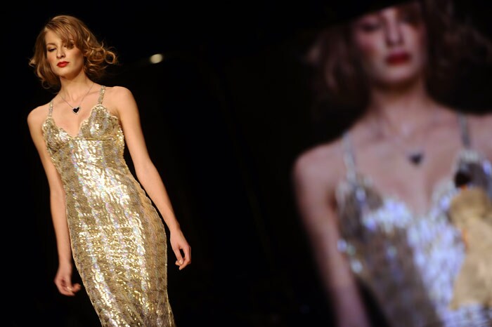 A model displays a creation of Seduzioni Diamonds Spring/Summer 2010 ready-to-wear collection on September 23, 2009 during the Women's fashion week in Milan.       AFP PHOTO / Filippo Monteforte