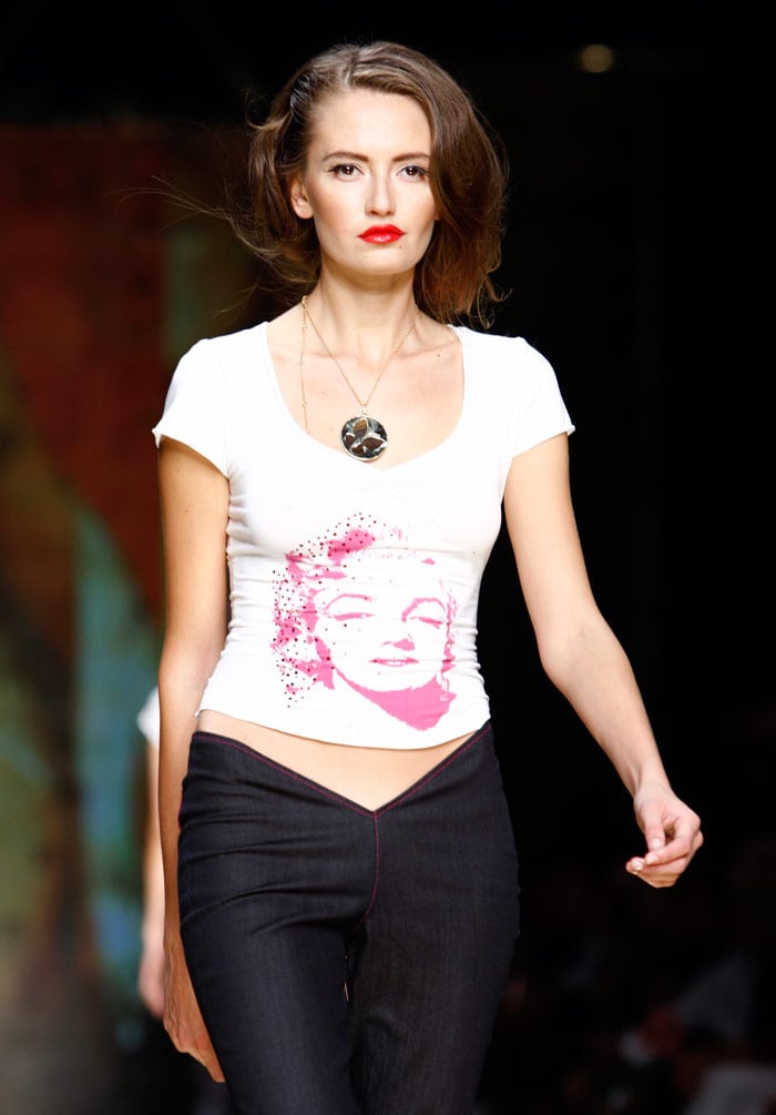 Argentinian model Belen Rodriguez displays a creation of Pin Up Stars Spring/Summer 2010 ready-to-wear collection on September 23, 2009 during the Women's fashion week in Milan.  AFP PHOTO / Christophe Simon