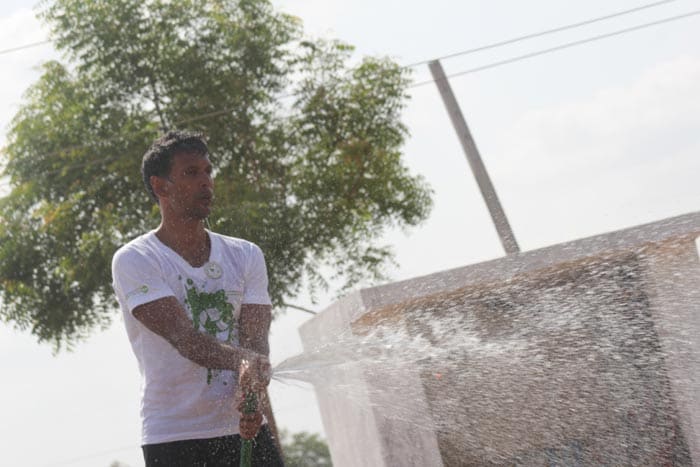 Milind Soman cools off in some extremely hot conditions.