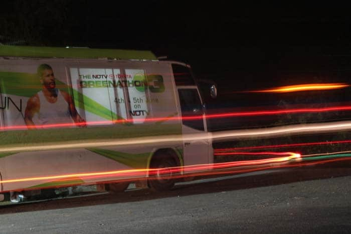 The Green Bus which acts as a pledge wall where people can come and extend their support with signatures on the bus.