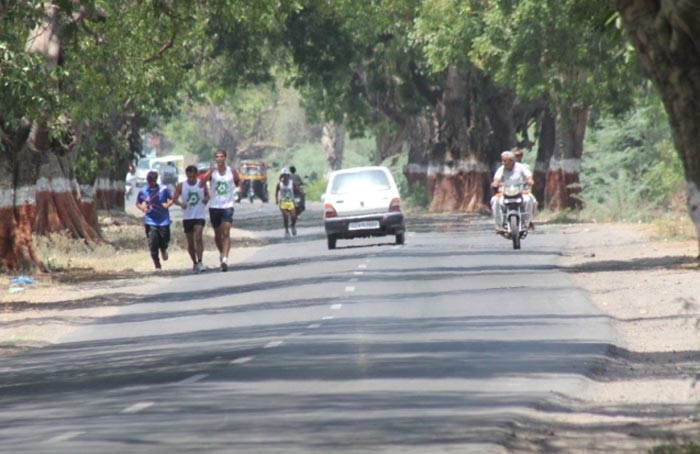 Milind Soman's team at the highway during his Green Run.