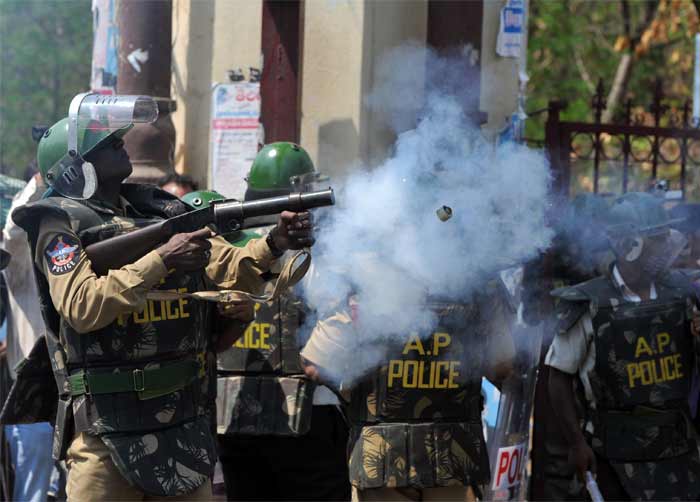 The police tried to hold back the crowd, even firing tear gas at them to stop them from advancing.