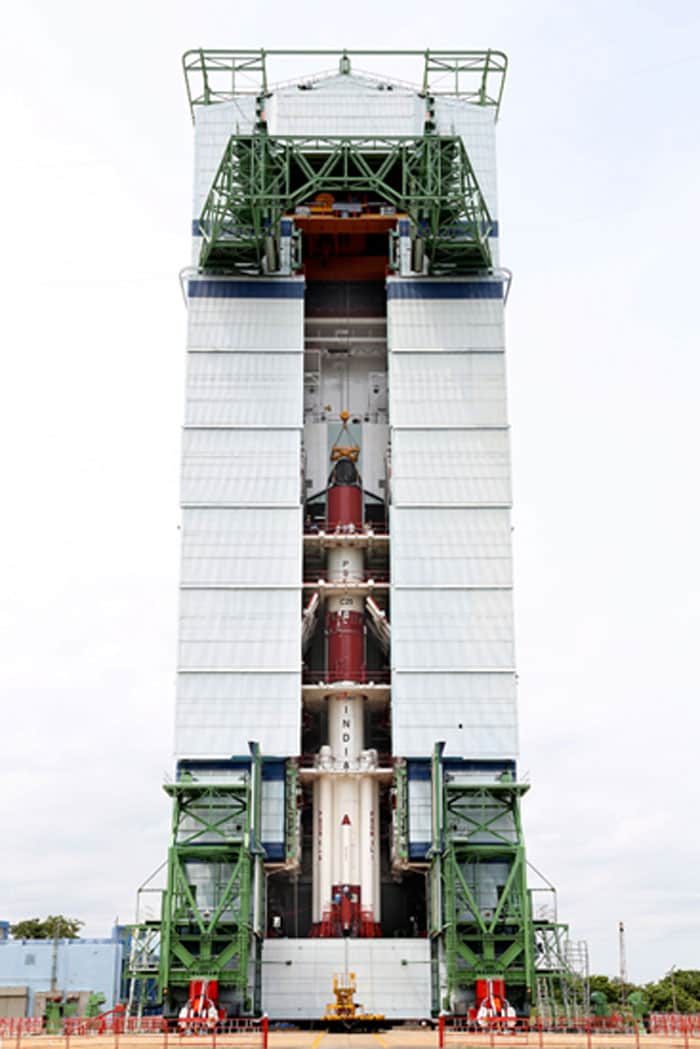 PSLV-C25 after the integration of all its four stages at Mobile Service Tower.<br><br>Photo Credit: ISRO