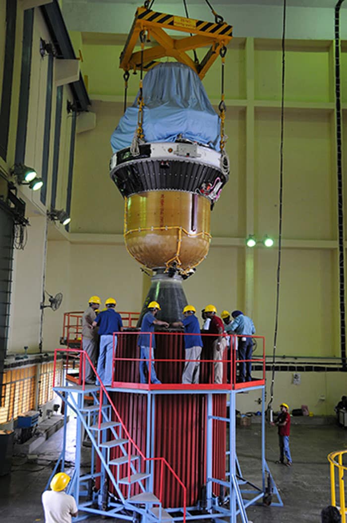 Hoisting of the third and fourth stages of PSLV-C25 during vehicle integration.<br><br>Photo Credit: ISRO