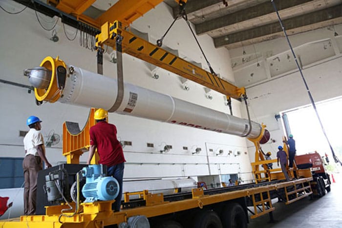 One of the strap-ons of PSLV-C25 being lowered to its transporter.<br><br>Photo Credit: ISRO