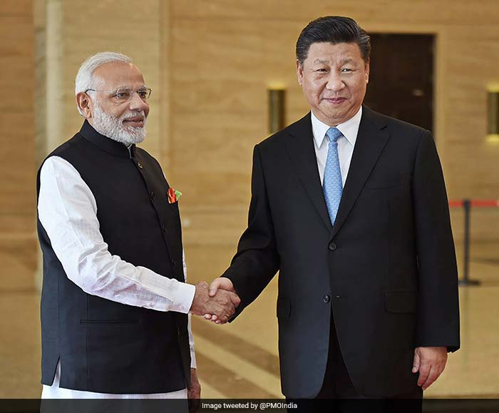 Photo : PM Modi Holds First Informal Meet With Xi Jinping, Invites Chinese President To India