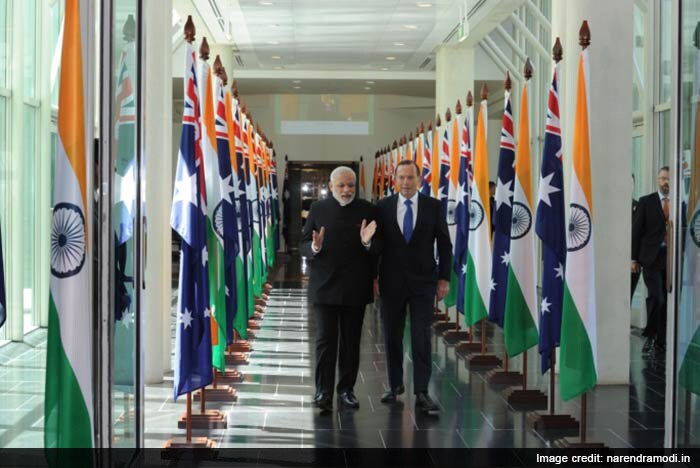 PM Narendra Modi and PM Tony Abbott in discussion at Canberra, Australia, in November.