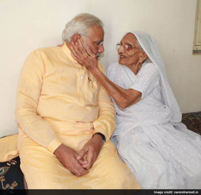 Narendra Modi seeking the blessings of his mother before taking charge as the Prime Minister of India.