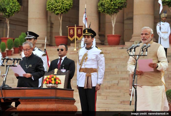 Narendra Modi taking oath as the 15th Prime Minister of India.