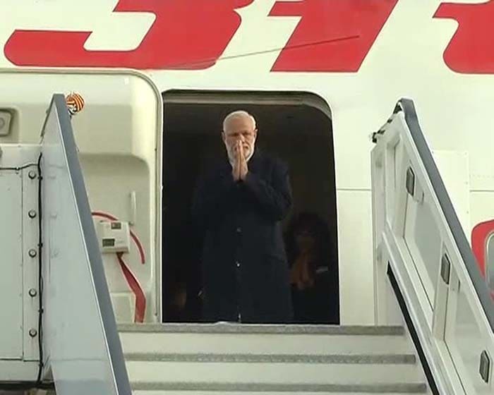 The Air India One lands at London Heathrow as PM Modi arrives in London for his three-day visit to United Kingdom. Hands together in a Namaste, Prime Minister Narendra Modi wore a black overcoat.