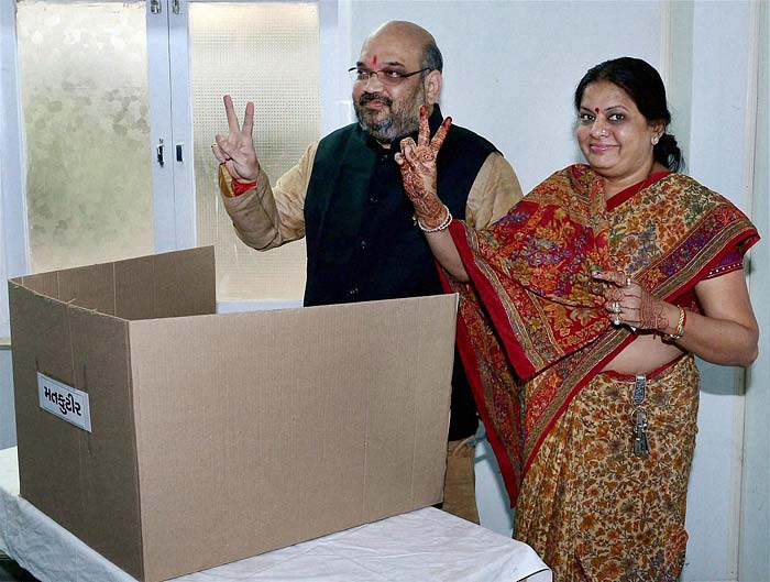 Former minister of Gujarat and BJP candidate Amit Shah and his wife, after casting their votes during the second phase of Assembly polls in Ahmedabad. Mr Shah, an accused in the Sohrabuddin Sheikh fake encounter case, is contesting from Naranpura constituency in Ahmedabad.