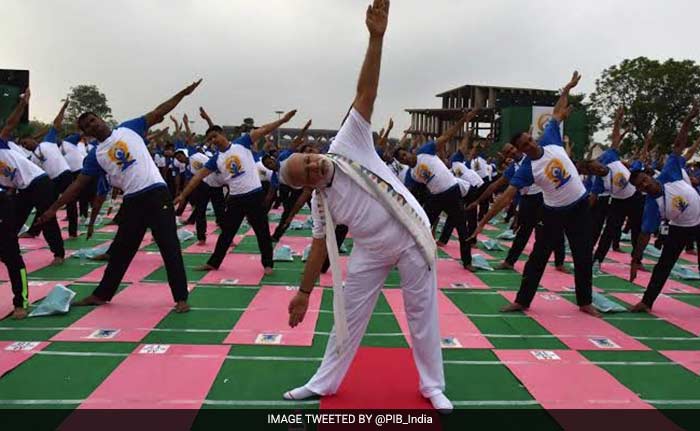 PM Narendra Modi practices yoga at the Capitol Complex in Chandigarh.