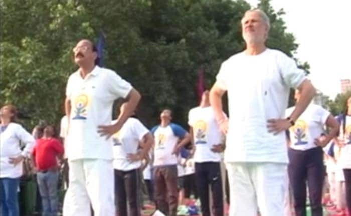 Union Minister Venkaiah Naidu and Delhi Lt.Governor Najeeb Jung perform yoga in Delhi.