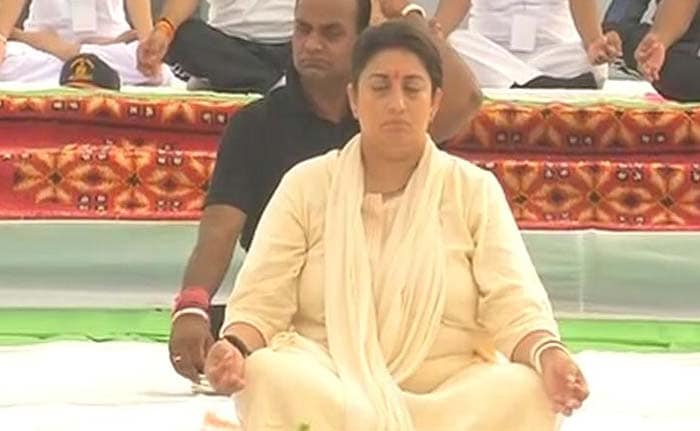 Smriti Irani does yoga asana in Bhopal.