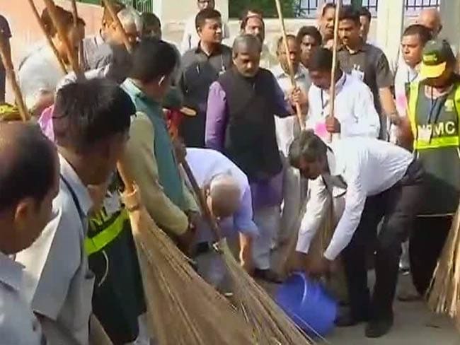 The PM and a Broom. Clean India Mission Launched.